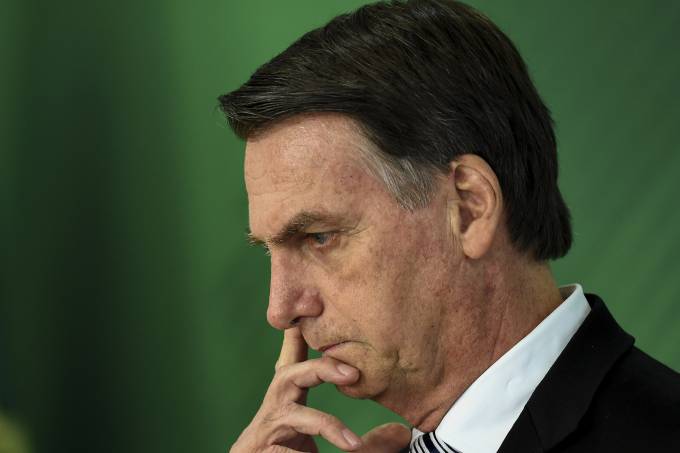 O presidente eleito Jair Bolsonaro, participa de uma coletiva de imprensa após reunião com o presidente Michel Temer em Brasília - 07/11/2018 (Evaristo Sa/AFP)